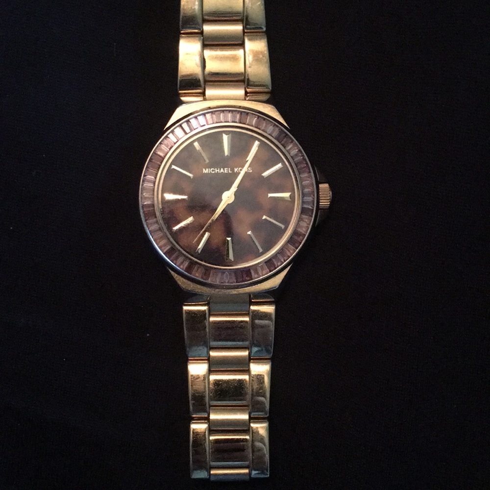 Michael Kors watch with lepeord face.